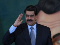 TOPSHOT - Venezuelan President Nicolas Maduro salutes after a press conference in Caracas on September 30, 2019. - Virtually all countries sent diplomats to the United Nations for the General Assembly last week, but Venezuela was a special case -- it had two delegations, each dueling for recognition. (Photo by …