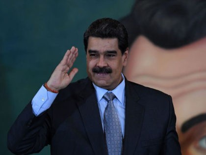 TOPSHOT - Venezuelan President Nicolas Maduro salutes after a press conference in Caracas on September 30, 2019. - Virtually all countries sent diplomats to the United Nations for the General Assembly last week, but Venezuela was a special case -- it had two delegations, each dueling for recognition. (Photo by …