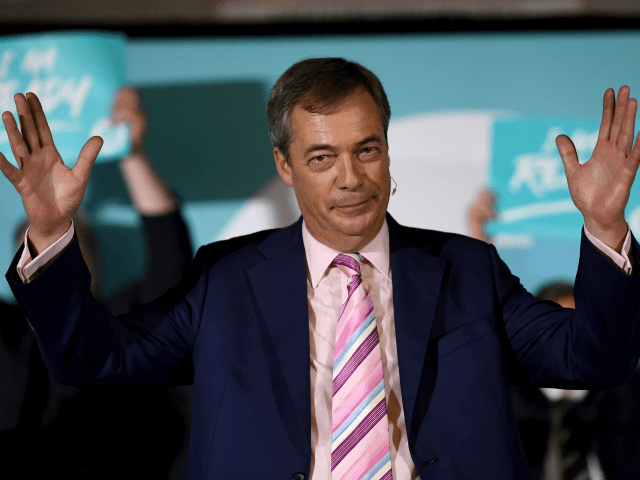 CAMBORNE, ENGLAND - OCTOBER 14: Leader of the Brexit Party, Nigel Farage addresses the audience at The Brexit Party rally at Carn Brea Leisure Centre, on October 14, 2019 in Camborne, England. The Brexit Party rally is part of a nationwide ‘We Are Ready’ tour ahead of a General Election. …