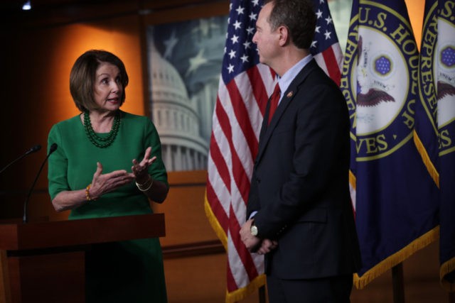 WASHINGTON, DC - OCTOBER 15: U.S. Speaker of the House Rep. Nancy Pelosi (D-CA) speaks as Chairman of House Intelligence Committee Rep. Adam Schiff (D-CA) listens during a news conference at the U.S. Capitol October 15, 2019 in Washington, DC. Pelosi said she is holding off on a full House …