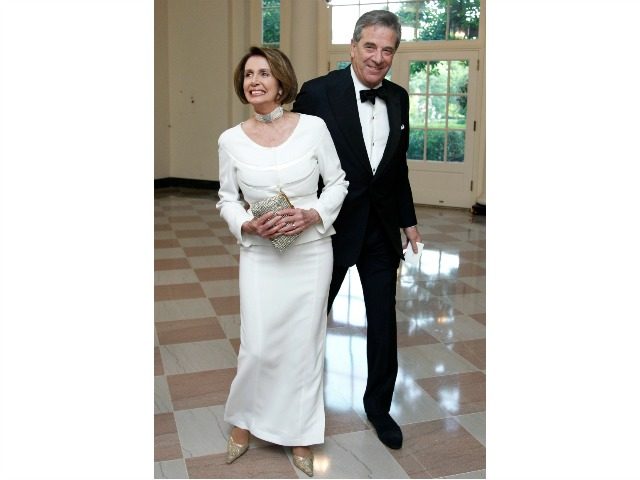 House Democratic Leader Nancy Pelosi, D-Calif., and her husband Paul Pelosi arrive for a State Dinner hosted by President Barack Obama and first lady Michelle Obama in honor of German Chancellor Angela Merkel at the White House in Washington, Tuesday, June 7, 2011. (House Democratic Leader Nancy Pelosi, D-Calif., and …