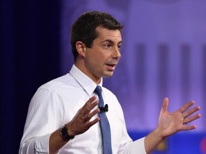 Democratic presidential hopeful Mayor of South Bend, Indiana Pete Buttigieg gestures as he speaks during a town hall devoted to LGBTQ issues hosted by CNN and the Human rights Campaign Foundation at The Novo in Los Angeles on October 10, 2019. (Photo by Robyn Beck / AFP) (Photo by ROBYN …