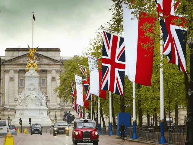 LONDON - MAY 4: The flags of Poland and Great Britain adorn flag poles along The Mall on M