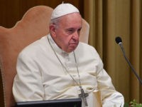 Pope Francis looks on during the morning session, on the second day of the Special Assembly of the Synod of Bishops for the Pan-Amazon Region on October 8, 2019 in the Vatican. - Pope Francis is gathering Catholic bishops at the Vatican to champion the isolated and poverty-struck indigenous communities …