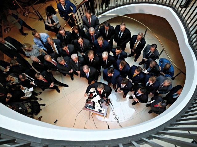 Rep. Andy Biggs, R-Ariz., speaks at a news conference in front of House Republicans after