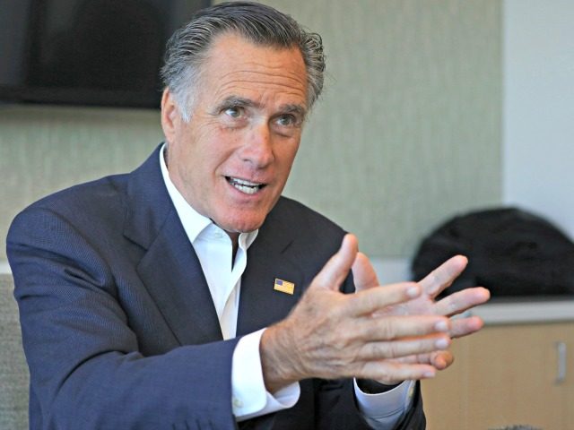 Sen. Mitt Romney, R-Utah, speaks to reporters following a roundtable discussion at Intermo