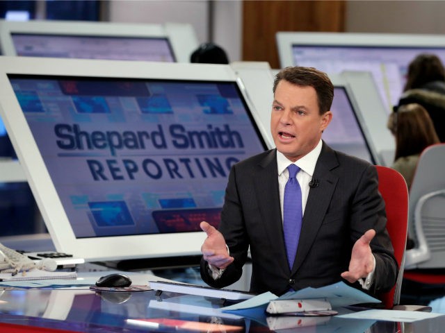 Fox News Channel chief news anchor Shepard Smith broadcasts from The Fox News Deck during his "Shepard Smith Reporting" program, in New York, Monday, Jan. 30, 2017. (AP Photo/Richard Drew)