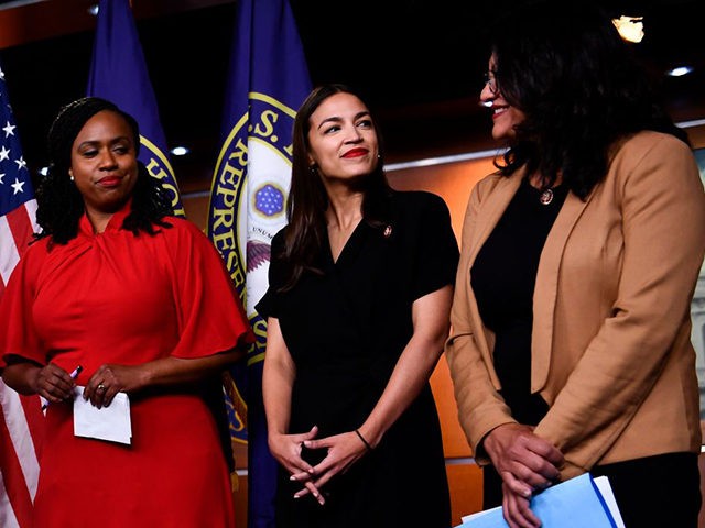 US Representatives Ayanna Pressley (D-MA) (L), Rashida Tlaib (D-MI) (R), and Alexandria Ocasio-Cortez (D-NY) look on during a press conference, to address remarks made by US President Donald Trump earlier in the day, at the US Capitol in Washington, DC on July 15, 2019. - President Donald Trump stepped up …