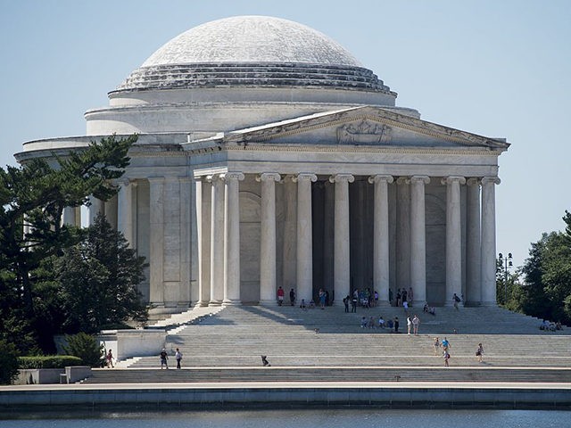 A black substance known as biofilm, a group of bacteria, fungi and algae, covers the Jefferson Memorial in Washington, DC, August 23, 2016, as the National Park Service works to find a safe way to remove the substance from the Memorial's marble exterior. / AFP / SAUL LOEB (Photo credit …
