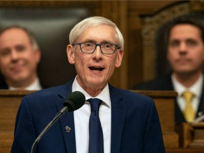 In this Jan. 22, 2019, file photo Wisconsin Gov. Tony Evers addresses a joint session of the Legislature in the Assembly chambers during the Governor's State of the State speech at the state Capitol in Madison, Wis. The Democratic Governor says a judge should suspend Republicans' lame duck law limiting …