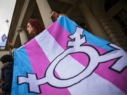 NEW YORK, NY - OCTOBER 24: L.G.B.T. activists and their supporters rally in support of transgender people on the steps of New York City Hall, October 24, 2018 in New York City. The group gathered to speak out against the Trump administration's stance toward transgender people. Last week, The New …