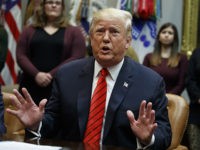 President Donald Trump speaks during an event where he congratulated astronauts Jessica Meir and Christina Koch as they conduct the first all-female spacewalk, from the Roosevelt Room of the White House, Friday, Oct. 18, 2019, in Washington. (AP Photo/Evan Vucci)