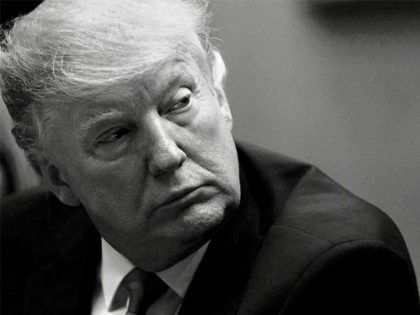 WASHINGTON, DC - JANUARY 25: U.S. President Donald Trump listens during a meeting with His