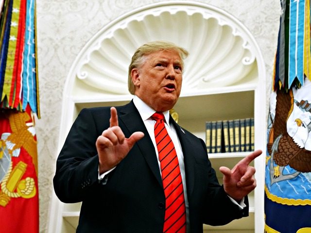 WASHINGTON, DC - SEPTEMBER 30: U.S. President Donald Trump gives pauses to answer a reporters' question about a whistleblower as he leaves the Oval Office after hosting the ceremonial swearing in of Labor Secretary Eugene Scalia at the White House September 30, 2019 in Washington, DC. Scalia was nominated by …