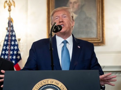 US President Donald Trump speaks about Syria in the Diplomatic Reception Room at the White House in Washington, DC, October 23, 2019 as US Vice President Mike Pence looks on. - President Donald Trump announced on Wednesday the United States would be lifting sanctions on Turkey, hailing the success of …