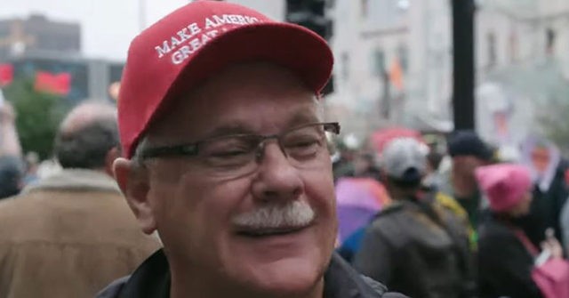 Watch Trump Supporter Calmly Reacts To Protester Spitting In His Face