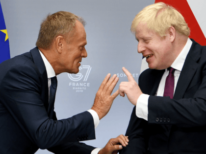 BIARRITZ, FRANCE - AUGUST 25: Britain's Prime Minister, Boris Johnson meets with President of the European Council, Donald Tusk at the G7 summit on August 25, 2019 in Biarritz, France. The French southwestern seaside resort of Biarritz is hosting the 45th G7 summit from August 24 to 26. High on …