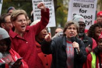 CHICAGO, ILLINOIS - OCTOBER 22: Democratic presidential candidate Sen. Elizabeth Warren (D-MA) (L) and American Federation of Teachers (AFT) president Randi Weingarten visit with striking Chicago teachers at Oscar DePriest Elementary School on October 22, 2019 in Chicago, Illinois. About 25,000 Chicago school teachers went on strike last week after …