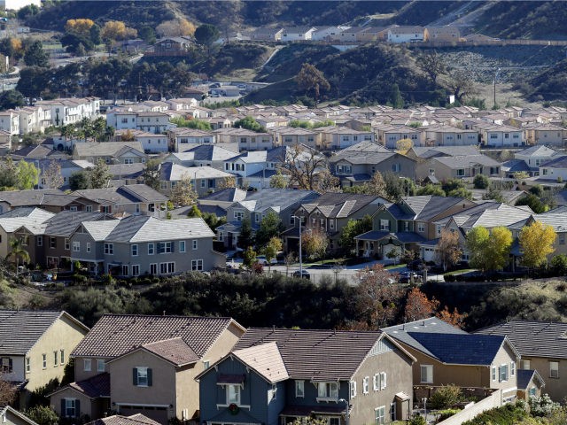 A subdivision of homes are stacked up Friday, Dec. 21, 2018, in Santa Clarita, Calif. California's population grew by 215,000 people but is still shy of 40 million, the state announced Friday. (AP Photo/Marcio Jose Sanchez)