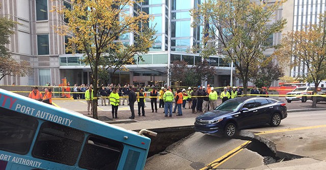 PHOTO: Sinkhole Swallows Back of Bus in Downtown Pittsburgh