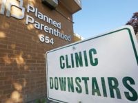 In this Aug. 21, 2019, file photo, a sign is displayed at Planned Parenthood of Utah in Salt Lake City. An appeals court is considering whether to block a Trump administration rule that bans taxpayer-funded health clinics from referring patients for an abortion, a rule that has already prompted many …