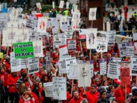 Teachers and supporters gather for the rally on the first day of strike by the Chicago Teachers Union on October 17, 2019 in Chicago, Illinois. (Photo by KAMIL KRZACZYNSKI / AFP) (Photo by KAMIL KRZACZYNSKI/AFP via Getty Images)