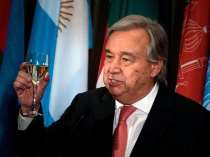 UN Secretary-General Antonio Guterres makes a toast during a luncheon at the United Nation