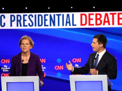 WESTERVILLE, OHIO - OCTOBER 15: Sen. Elizabeth Warren (D-MA) listens to South Bend, Indiana Mayor Pete Buttigieg during the Democratic Presidential Debate at Otterbein University on October 15, 2019 in Westerville, Ohio. A record 12 presidential hopefuls are participating in the debate hosted by CNN and The New York Times. …