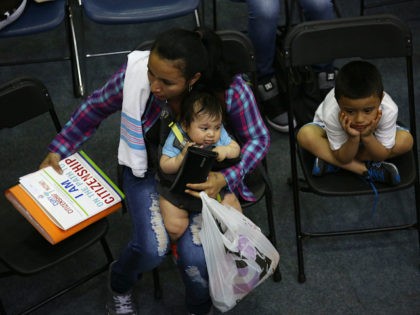 NEW YORK, NY - MAY 14: Immigrants await assistance with their U.S. citizenship application