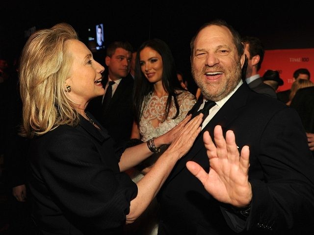 NEW YORK, NY - APRIL 24: Secretary of State Hillary Rodham Clinton and producer Harvey Wei