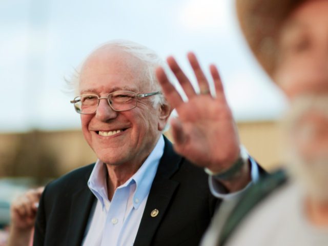 Democratic presidential candidate U.S. Sen. Bernie Sanders waves to supporters after arriving at the Comanche Nation Complex for the annual Comanche Nation Fair Powwow, Sunday, Sept. 22, 2019, in Lawton, Okla. (AP Photo/Gerardo Bello)