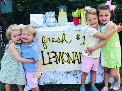 Viral Photo of Kids’ Lemonade Stand Raises over $125K for Children’s Hospital