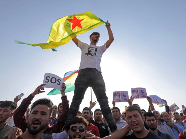 Kurds take part in a demonstration in Arbil, the capital of the northern Iraqi Kurdish autonomous region, on October 10, 2019 against the Turkish offensive in northeastern Syria. - Syria's Kurds battled to hold off a Turkish invasion on October 9 after air strikes and shelling launched a long-threatened operation …
