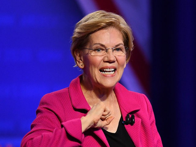 Democratic presidential hopeful Massachusetts Senator Elizabeth Warren gestures as she arr