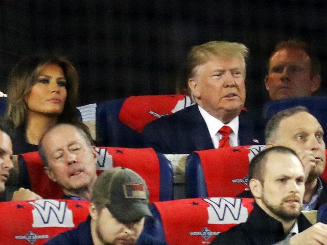 WASHINGTON, DC - OCTOBER 27: (L-R) Melania and Donald Trump attend Game Five of the 2019 W