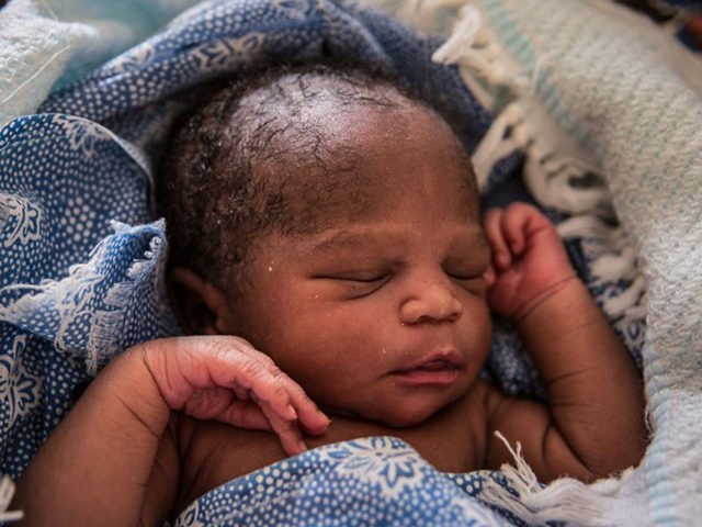 A picture taken on February 20, 2018, shows a newborn at the Juba Teaching Hospital in Juba, the South Sudanese capital's only fully functioning maternity ward which has five beds and only solar-powered electricity.