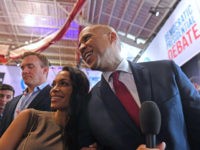 US actress Rosario Dawson (L) and boyfriend Democratic presidential hopeful New Jersey Senator Cory Booker pose for pictures in the spin room after the fourth Democratic primary debate of the 2020 presidential campaign season co-hosted by The New York Times and CNN at Otterbein University in Westerville, Ohio on October …