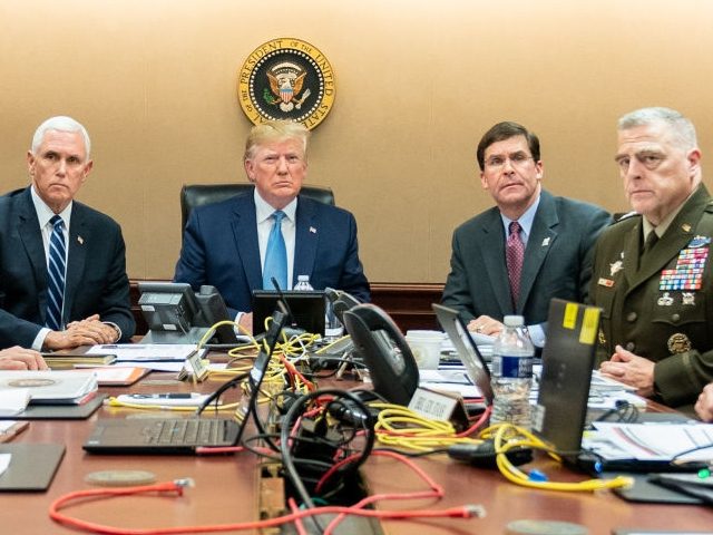 WASHINGTON, DC - OCTOBER 26: In this handout photo provided by the White House, President Donald J. Trump is joined by Vice President Mike Pence (2nd L), National Security Advisor Robert O’Brien (L), Secretary of Defense Mark Esper (3rd R), Chairman of the Joint Chiefs of Staff U.S. Army General …