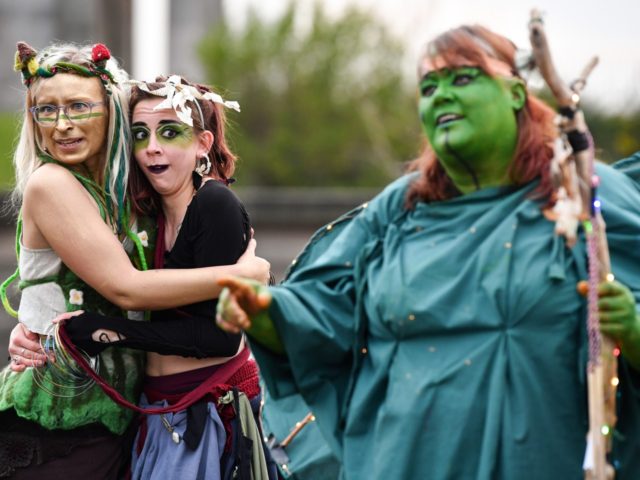 Beltane Fire Society performers celebrate the coming of summer by participating in the Bel