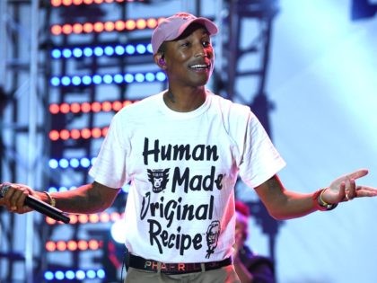 MIAMI, FL - DECEMBER 08: Pharrell Williams performs onstage during the American Express Pl