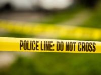 Tape cordons off the scene of a shooting in the Ogontz section of Philadelphia, Thursday, Aug. 15, 2019. (AP Photo/Matt Rourke)