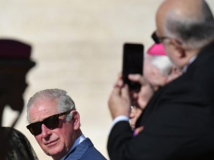 Charles, Prince of Wales (L) attends the Canonization Mass for English John Henry Newman, Italian Giuseppina Vannini, Indian Maria Teresa Chiramel Mankidiyan, Brazilian Dulce Lopes Pontes, and Swiss Margarita Bays on October 13, 2019 In Saint Peter's square at the Vatican. (Photo by Alberto PIZZOLI / AFP) (Photo by ALBERTO …