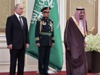 Russian President Vladimir Putin and Saudi Arabia's King Salman attend the official welcome ceremony in Riyadh, Saudi Arabia, on October 14, 2019. (Photo by Alexey NIKOLSKY / SPUTNIK / AFP) (Photo by ALEXEY NIKOLSKY/SPUTNIK/AFP via Getty Images)