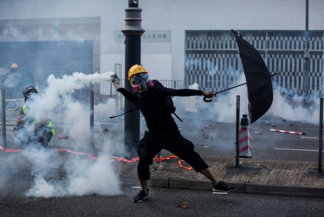 Police shoot Hong Kong protester as China celebrates 70th birthday