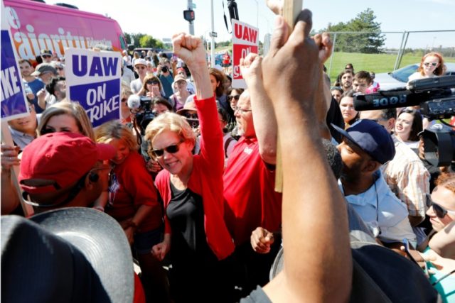 Elizabeth Warren of Massachusetts joins striking auto workers in Detroit. Polls give her, and most Democrats, an edge over Trump in Michigan As US factories falter, White House insists economy like 'a rock'
