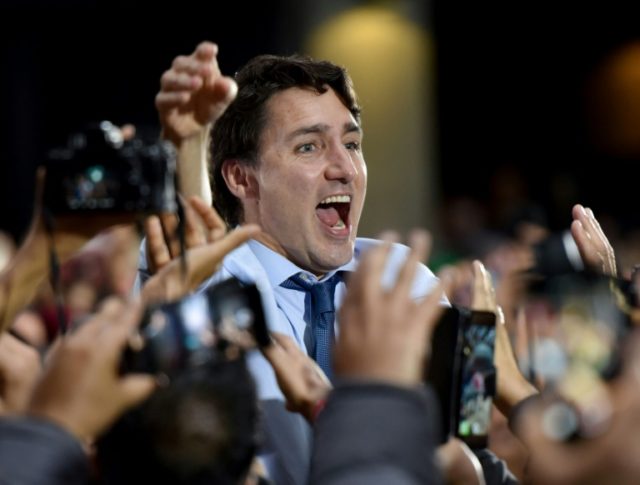 Canadians vote in tight election as Trudeau aims to cling to power