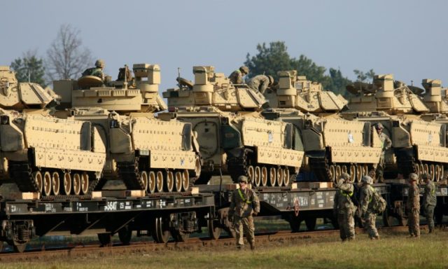 US moves troops, tanks into Lithuania in message to Russia - Breitbart