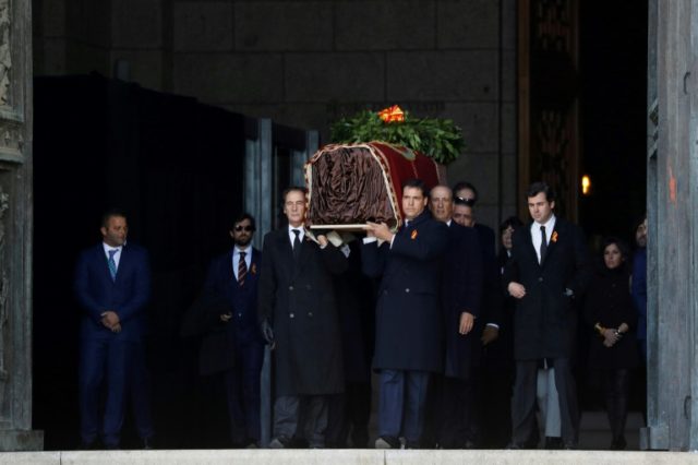 After exhumation, Spain reburies Franco in discreet tomb