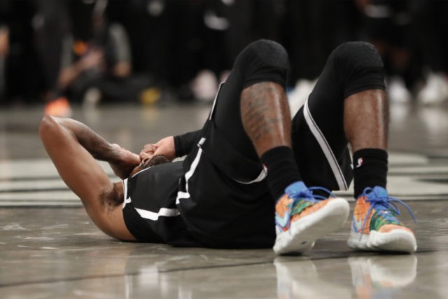 Timberwolves Nets Basketball Kyrie Irving Brooklyn Nets guard Kyrie Irving (11) lies on the floor after failing to score in the waning seconds of overtime of an NBA basketball game Wednesday, Oct. 23, 2019, in New York. The Timberwolves defeated the Nets 127 126. Irving had 50 points. (AP Photo/Kathy Willens) The Associated Press