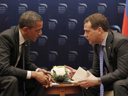 U.S. President Barack Obama, left, and Russian President Dmitry Medvedev chat during a bil